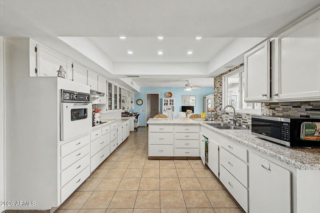 18007 N CONQUISTADOR Drive, Sun City West, AZ 85375 — photo 4