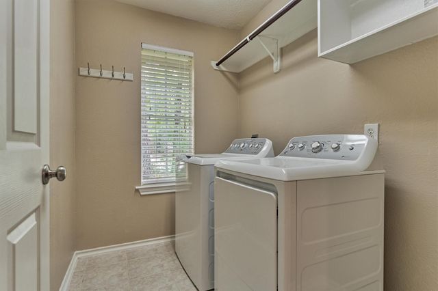 27 E Russet Grove Circle, The Woodlands, TX 77384