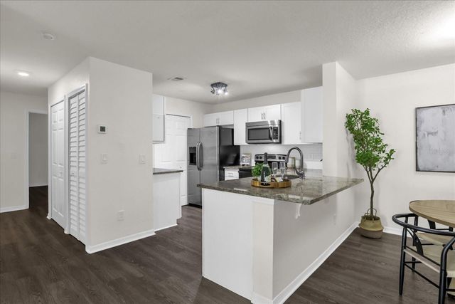 7606 PISSARRO DRIVE 14204, Orlando, FL 32819