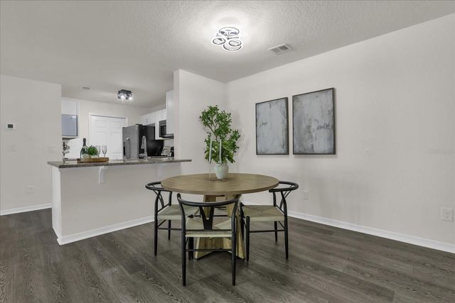 7606 PISSARRO DRIVE 14204, Orlando, FL 32819