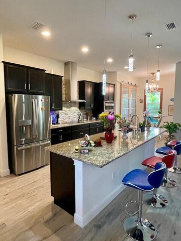 567 SW Hidden River Avenue, Palm City, FL 34990