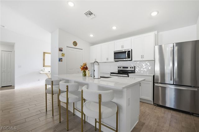 1910 NW 27th PL, Cape Coral, FL 33993