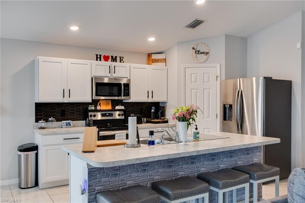 2426 NW 20th AVE, CAPE CORAL, FL 33993 — photo 2