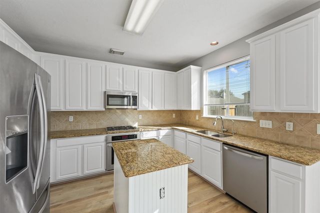 9107 Huckinston Court, Spring, TX 77379