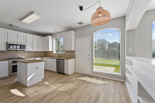 9107 Huckinston Court, Spring, TX 77379