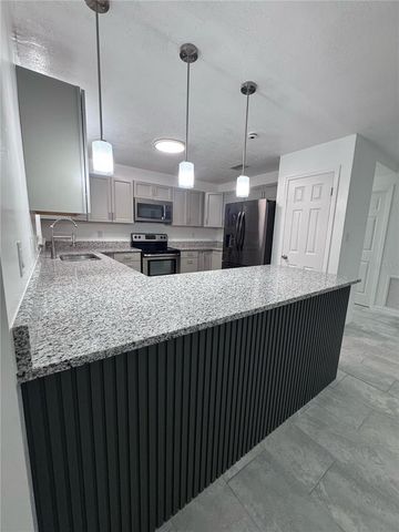 9910 CANTERBURY DRIVE, Leesburg, FL 34788