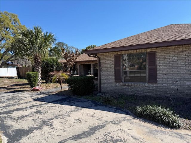 9910 CANTERBURY DRIVE, Leesburg, FL 34788