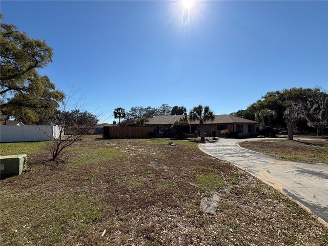 9910 CANTERBURY DRIVE, Leesburg, FL 34788