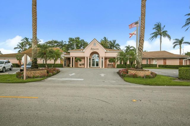 516 Muirfield Drive, Atlantis, FL 33462