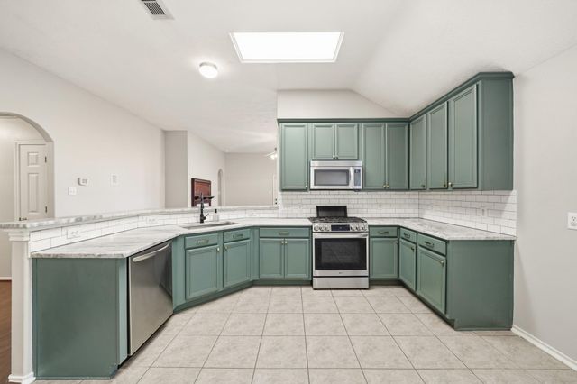 11811 Misty Peak Lane, Humble, TX 77346