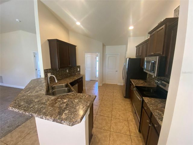 2201 ANGEL FISH LOOP, Leesburg, FL 34748