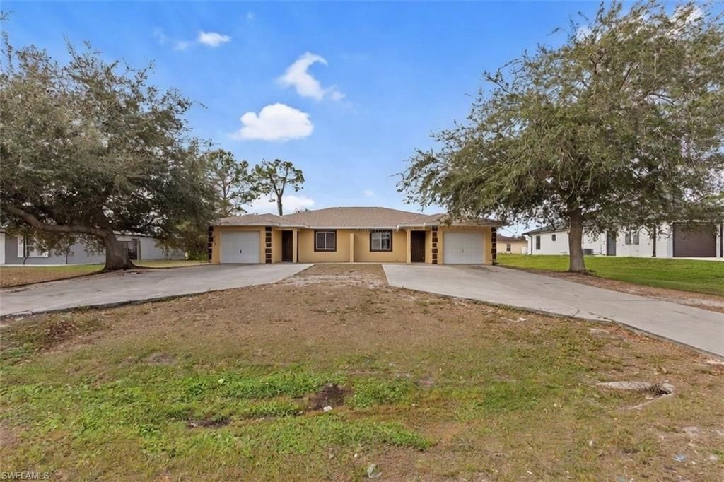 5113/5115 24th ST SW, LEHIGH ACRES, FL 33973 — exterior