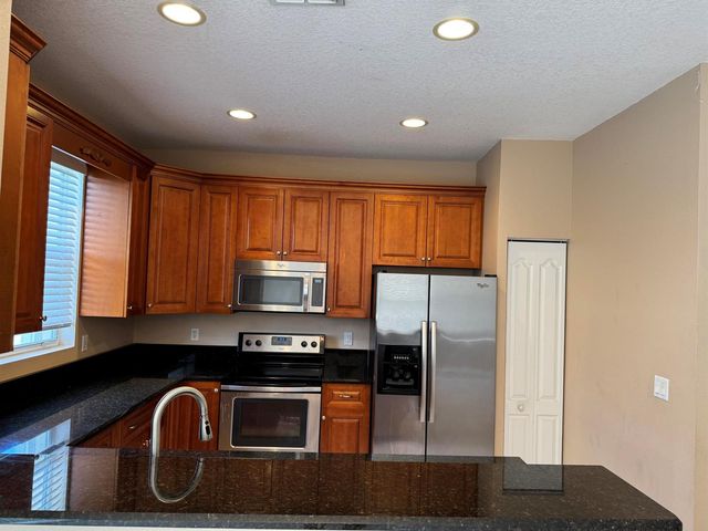 911 Seminole Palms Drive, Lake Worth, FL 33463