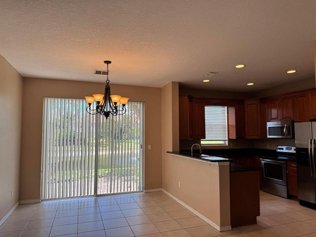 911 Seminole Palms Drive, Lake Worth, FL 33463
