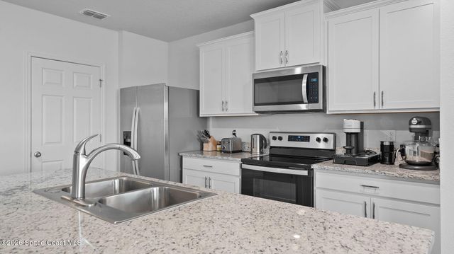 1003 Remington Green Drive SE, Palm Bay, FL 32909