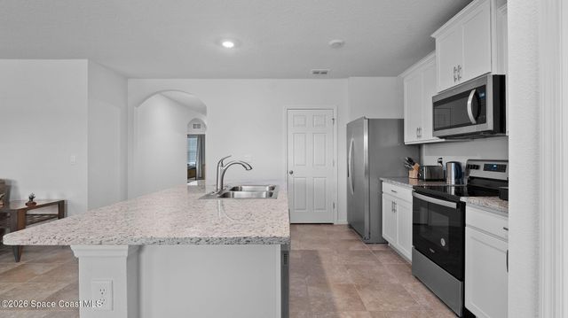 1003 Remington Green Drive SE, Palm Bay, FL 32909