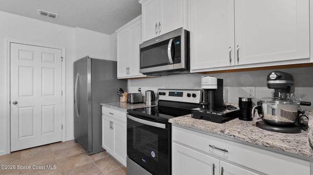 1003 Remington Green Drive SE, Palm Bay, FL 32909