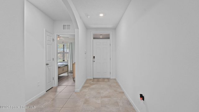 1003 Remington Green Drive SE, Palm Bay, FL 32909