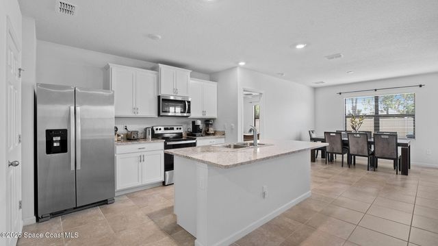 1003 Remington Green Drive SE, Palm Bay, FL 32909