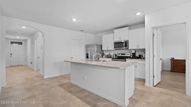 1003 Remington Green Drive SE, Palm Bay, FL 32909