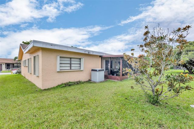 9802 NW 75th Court, Tamarac, FL 33321