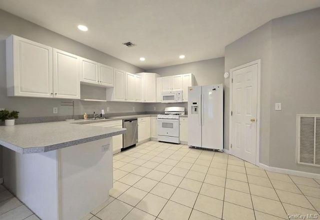 19 Sunflower Ridge Road, South Setauket, NY 11720