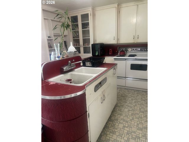 67623 E BAY Rd, North Bend, OR 97459