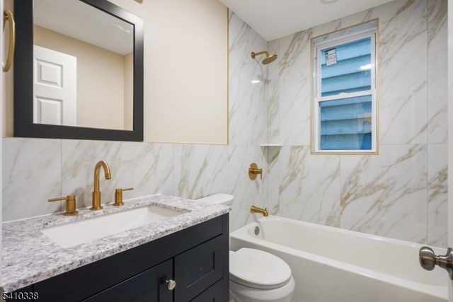 134 Burgess Pl, Passaic City, NJ 07055