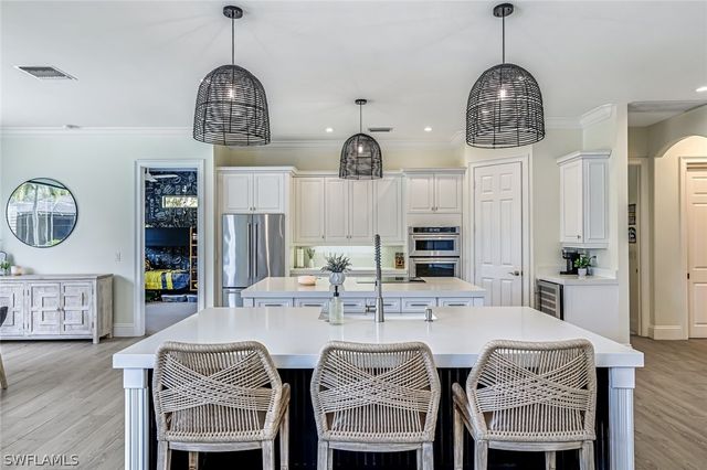 9809 Rocky Bank DR, Naples, FL 34109