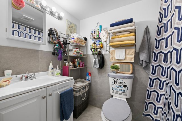 24 COLONIAL CLUB Drive 101, Boynton Beach, FL 33435