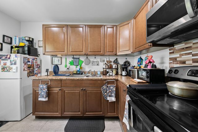 24 COLONIAL CLUB Drive 101, Boynton Beach, FL 33435