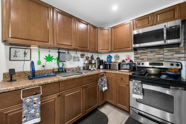 24 COLONIAL CLUB Drive 101, Boynton Beach, FL 33435