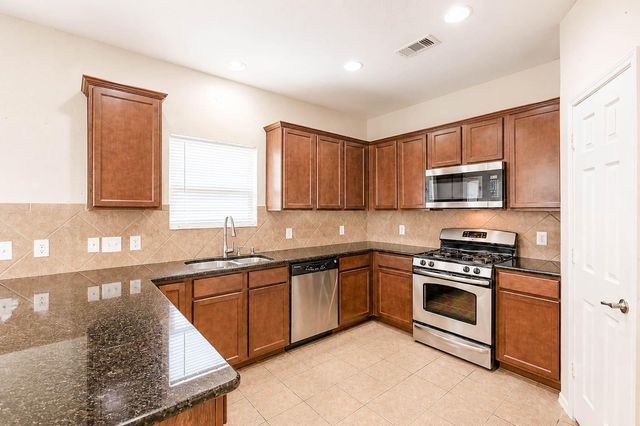 10311 Whisper Bluff Drive, Humble, TX 77396