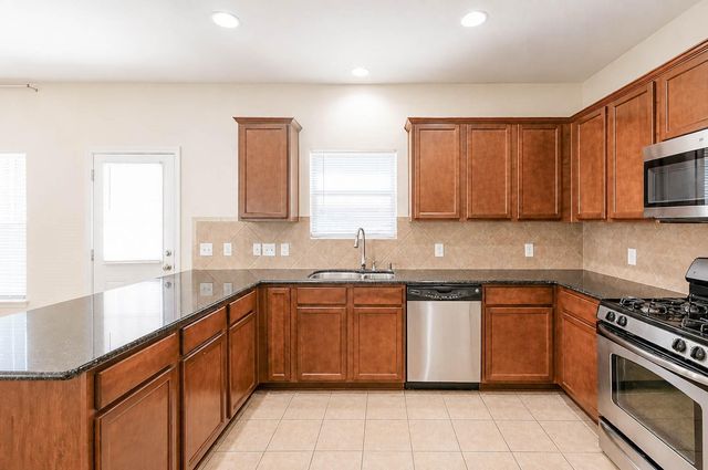 10311 Whisper Bluff Drive, Humble, TX 77396