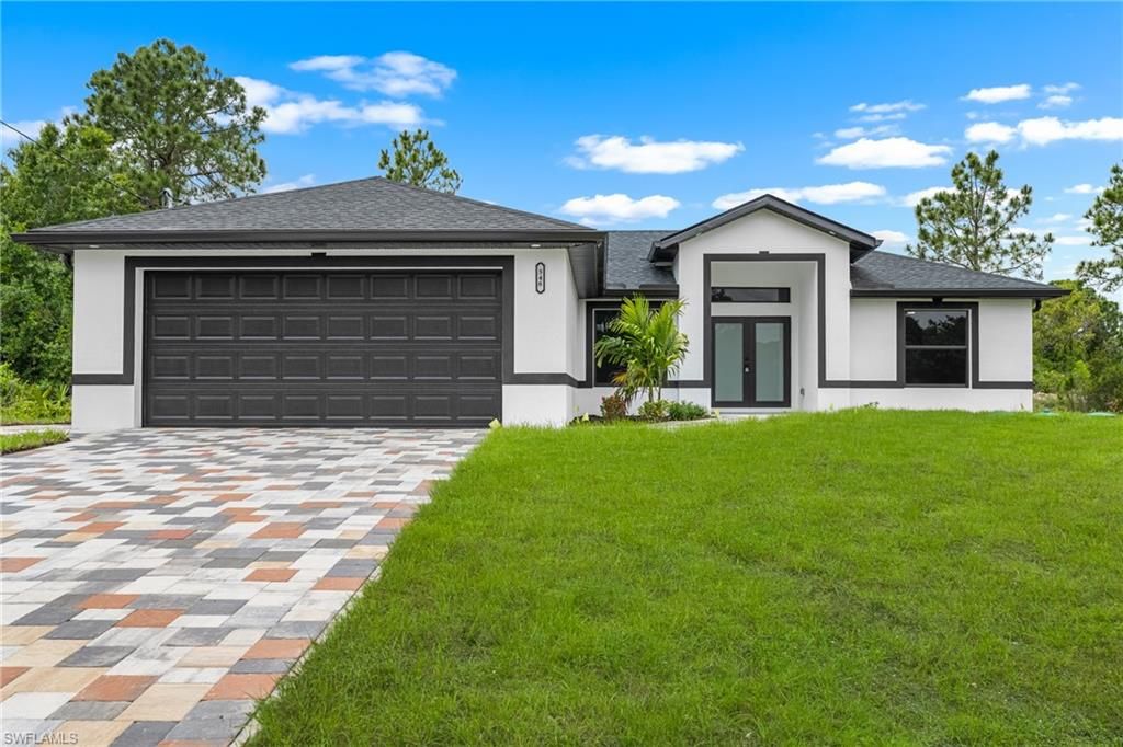 546 Genoa AVE S, LEHIGH ACRES, FL 33974 — exterior