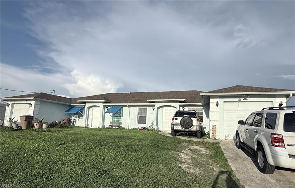 1109-1111 Gilbert AVE S, LEHIGH ACRES, FL 33973 — exterior