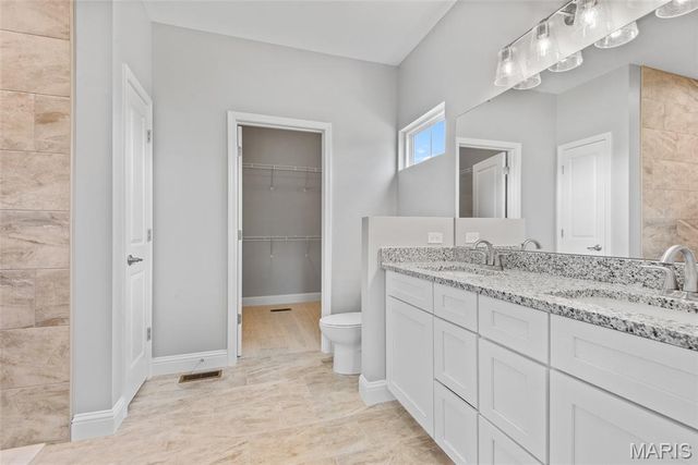 254 Smola Woods Court, Glen Carbon, IL 62034