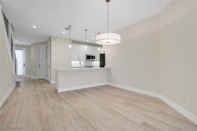 7540 Carnegie WAY, Naples, FL 34119