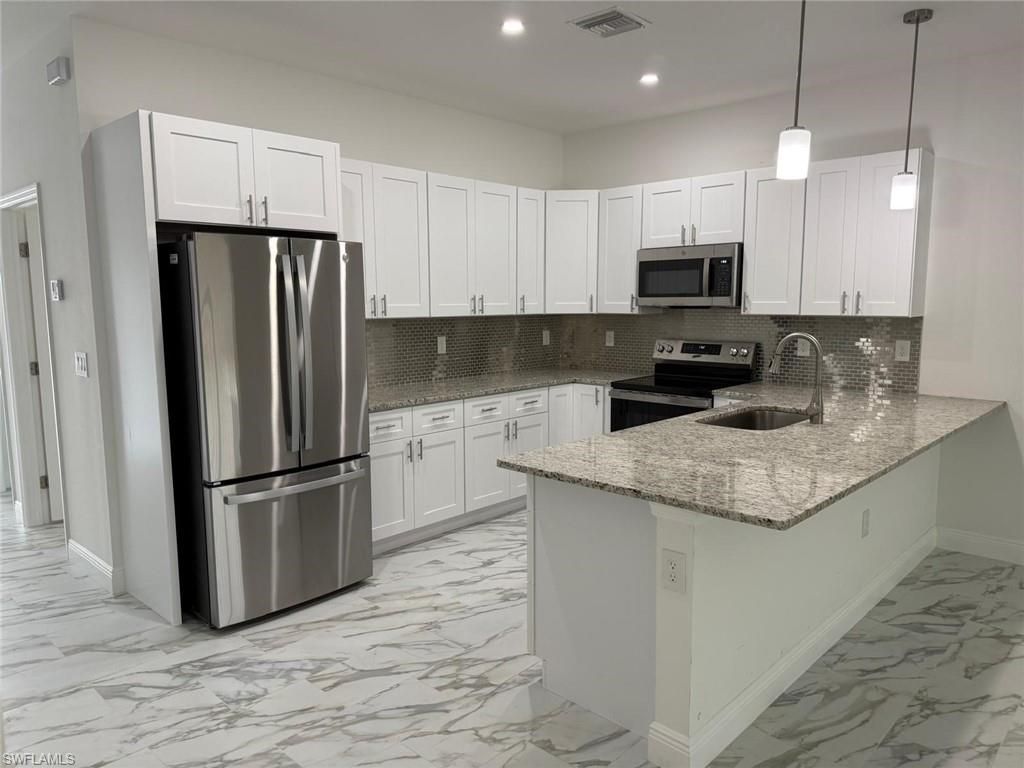 5249-5251 Centennial BLVD, LEHIGH ACRES, FL 33971 — photo 2