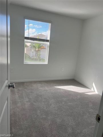 19550 Fairhill CT, Lehigh Acres, FL 33974