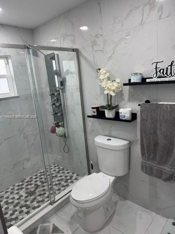 702 NW Orchid St, Port St. Lucie, FL 34983