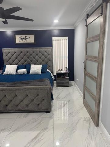 702 NW Orchid St, Port St. Lucie, FL 34983