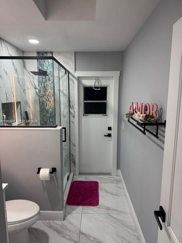 702 NW Orchid St, Port St. Lucie, FL 34983