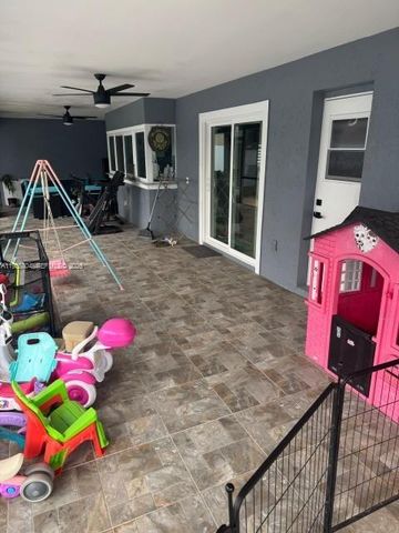 702 NW Orchid St, Port St. Lucie, FL 34983