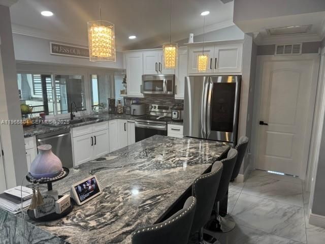 702 NW Orchid St, Port St. Lucie, FL 34983