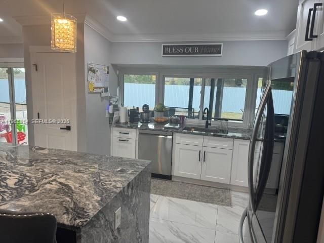 702 NW Orchid St, Port St. Lucie, FL 34983