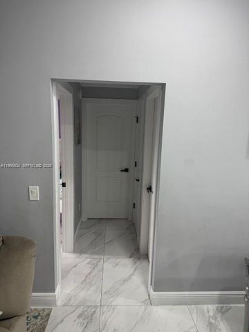 702 NW Orchid St, Port St. Lucie, FL 34983