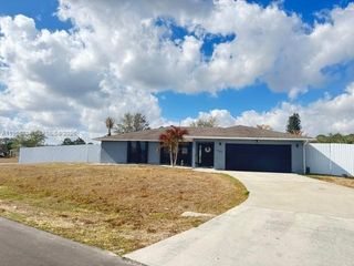702 NW Orchid St, Port St. Lucie, FL 34983