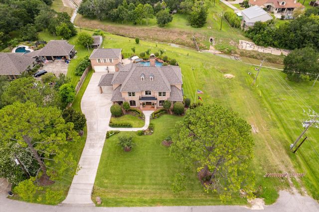 1002 Cowards Creek Court, Friendswood, TX 77546
