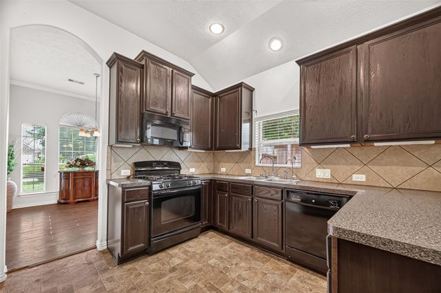 10511 Whisper Bluff Drive, Humble, TX 77396